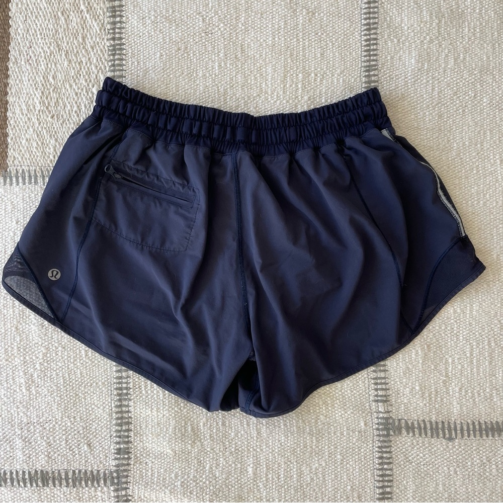 - LULULEMON NAVY LOW RISE 4” SHORT